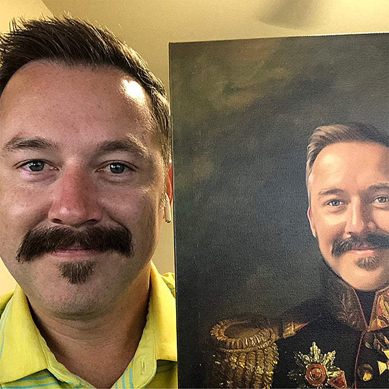 He received the best gift a husband can hope for! Look how happy he is next to his military portrait painting. Now everyone knows who is in charge home!