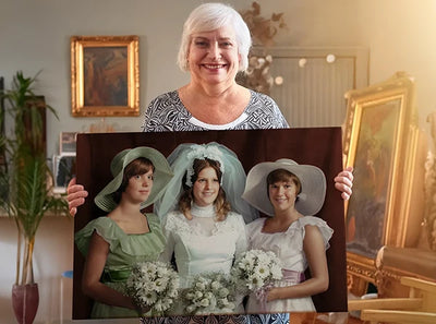 The customer displays the results of a professional photo colorization service