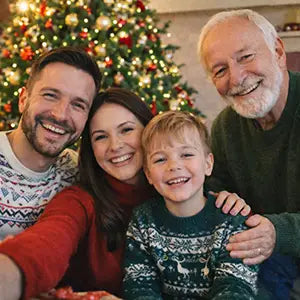 Edited Christmas family photo with a missing family member added in.