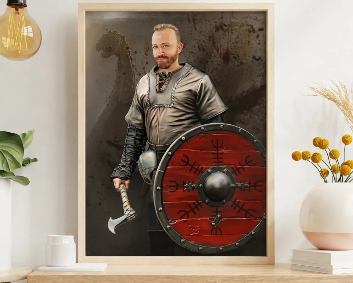 Framed viking portrait painting of a man in Norse attire with a red shield and axe on a shelf.
